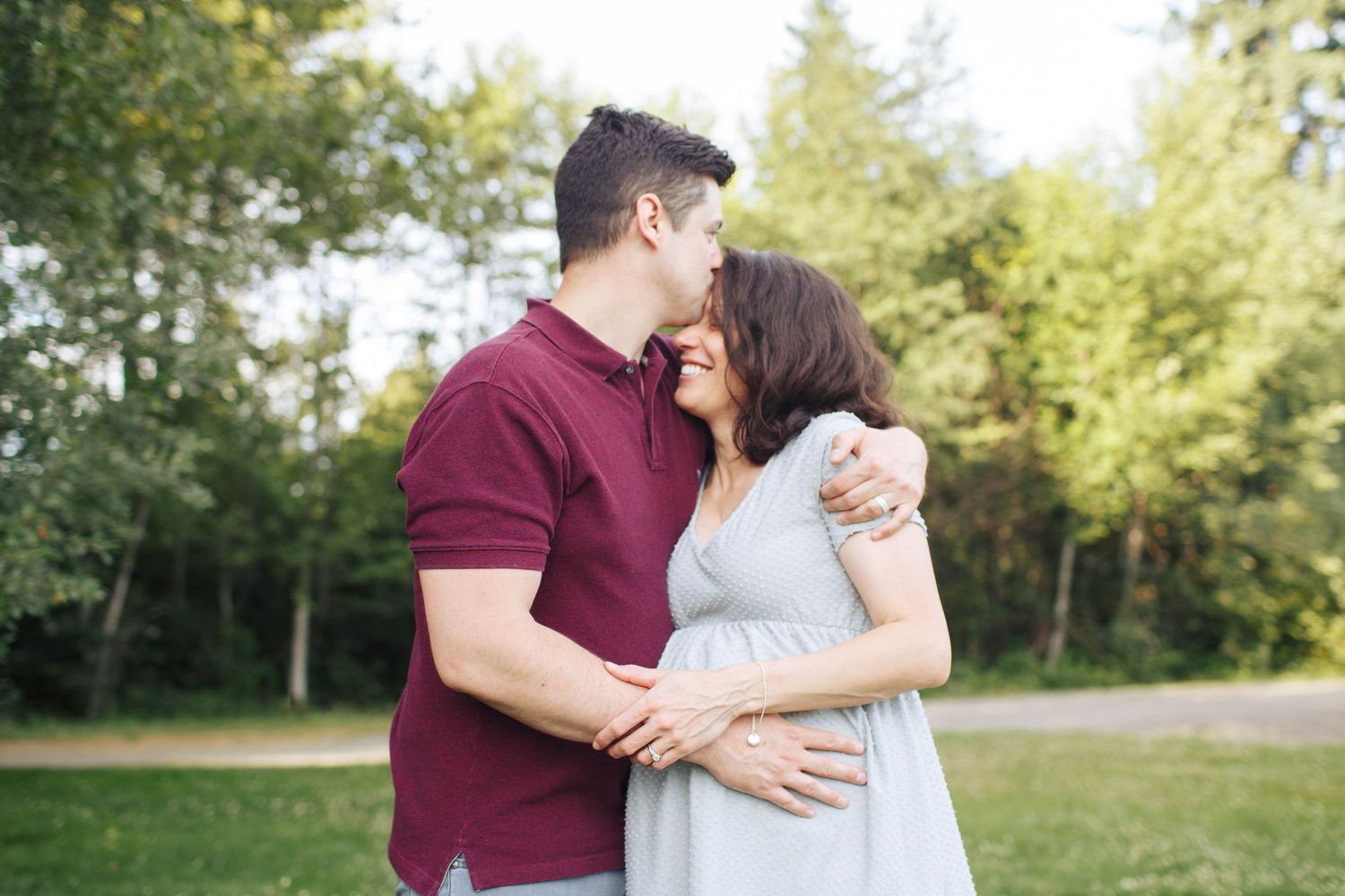 Everett maternity photography: a pregnant mother and husband at Willis D. Tucker park in Snohomish
