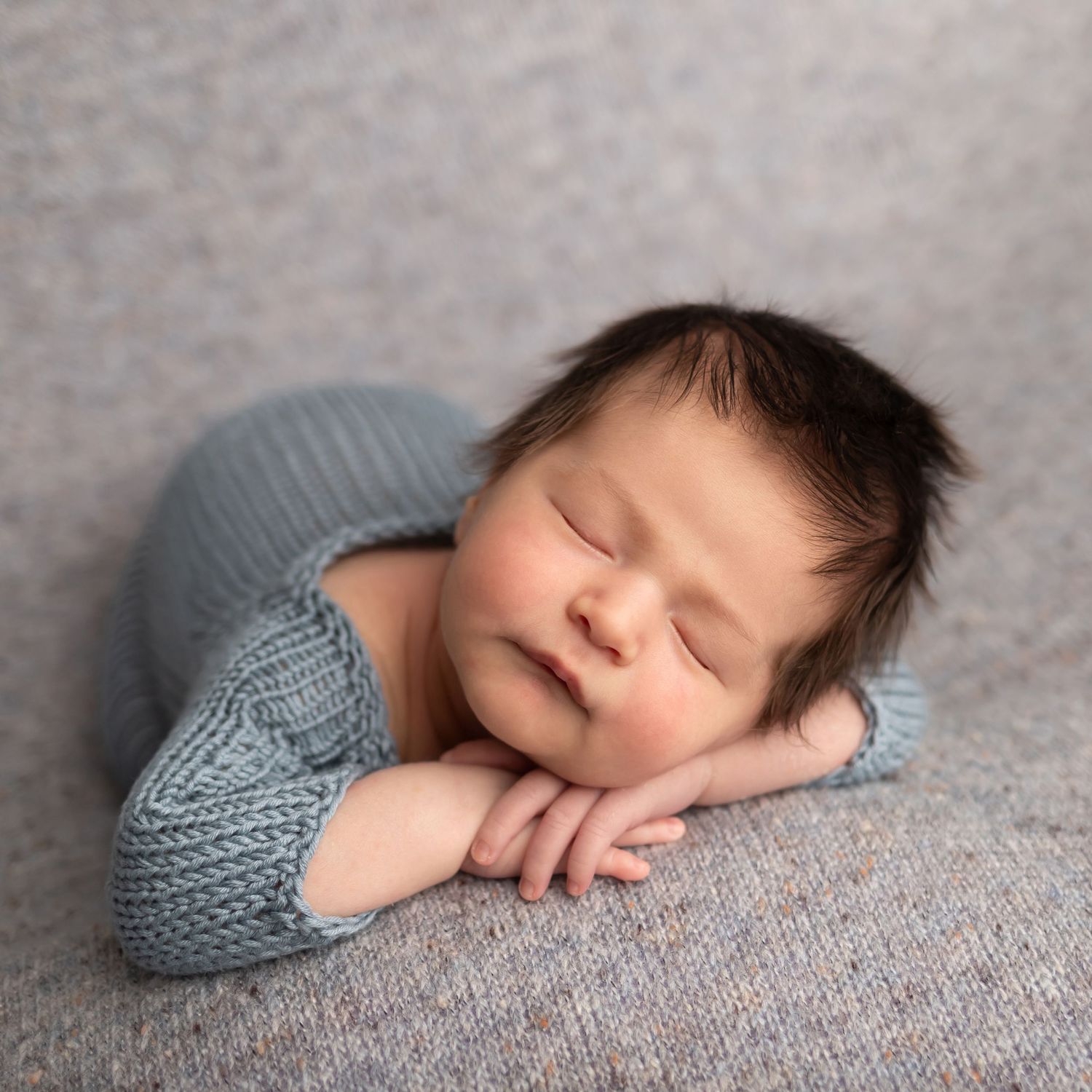 Newborn in blue, taken by Jen Knightstep, Photographer
