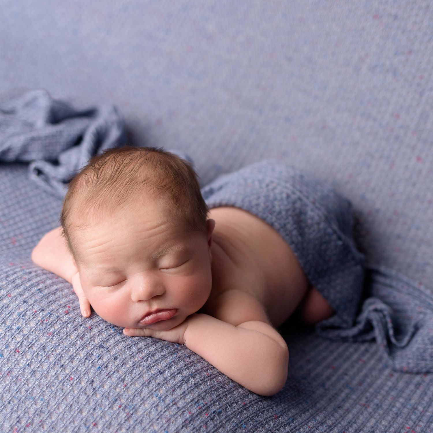 Newborn in blue, taken by Jen Knightstep, Photographer