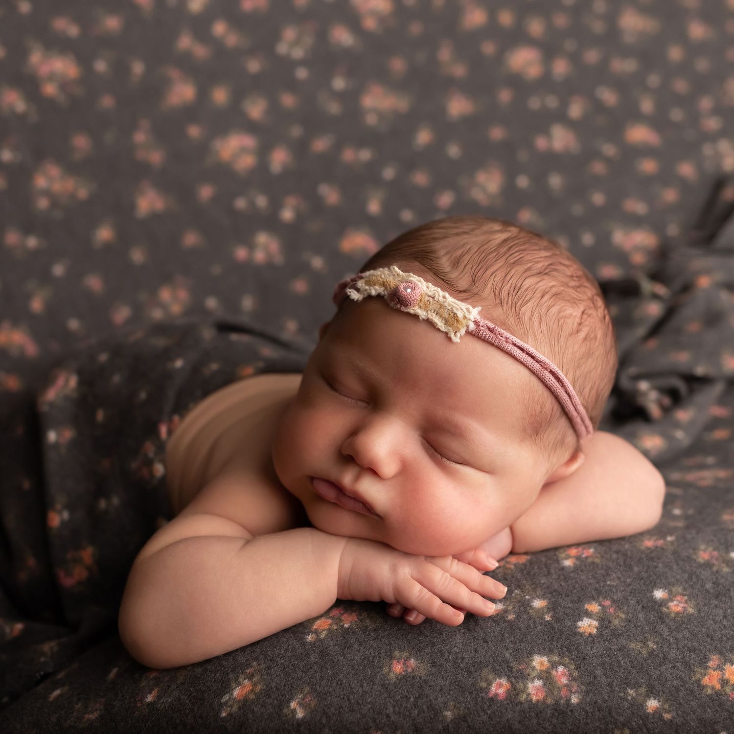 Newborn in black and pink, taken by Jen Knightstep, Photographer