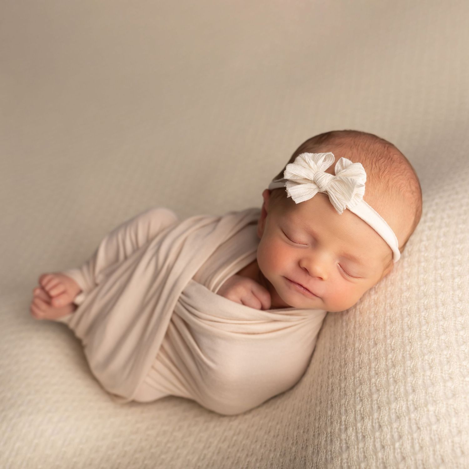 Newborn in cream, taken by Jen Knightstep, Photographer