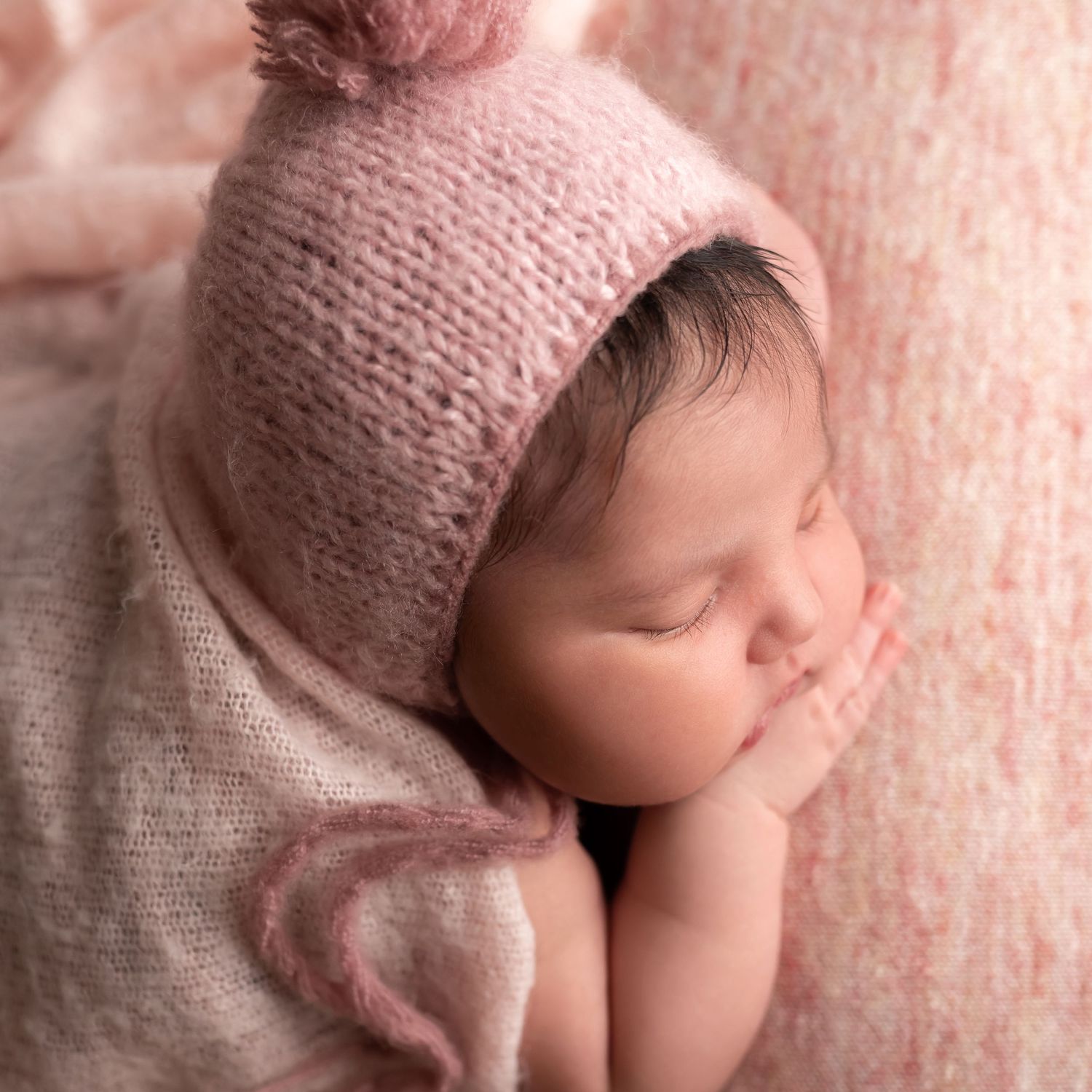 Newborn in pink, taken by Jen Knightstep, Photographer