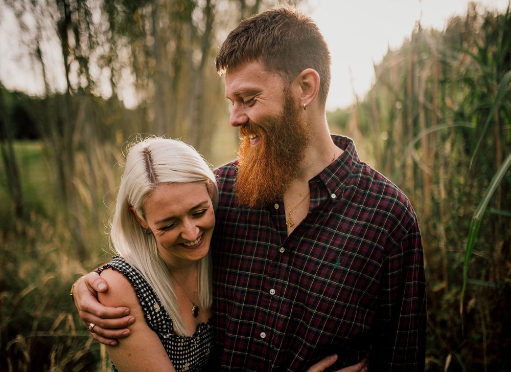 Intimate outdoor couple photoshoot with natural lighting and forest backdrop. Worcestershire Wedding photographer.