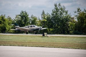 Piper airplane taking off at beaver county airport.
