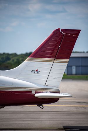 Tail of airplane and beaver county airport.