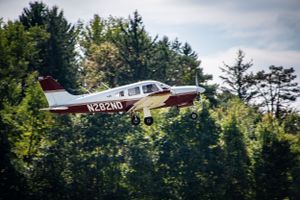 Piper taking off at beaver county airport