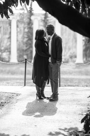 A couple about to kiss in black and white.