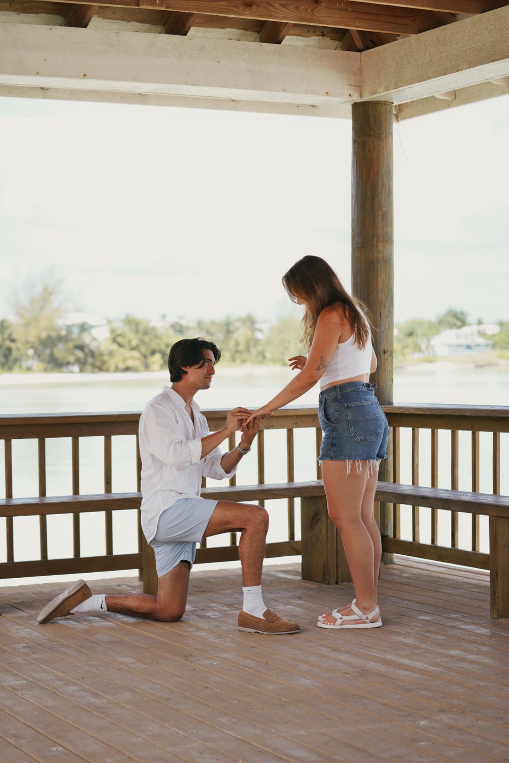 Engagement photoshoot in Spanish Wells with turquoise water and bright sunny skies