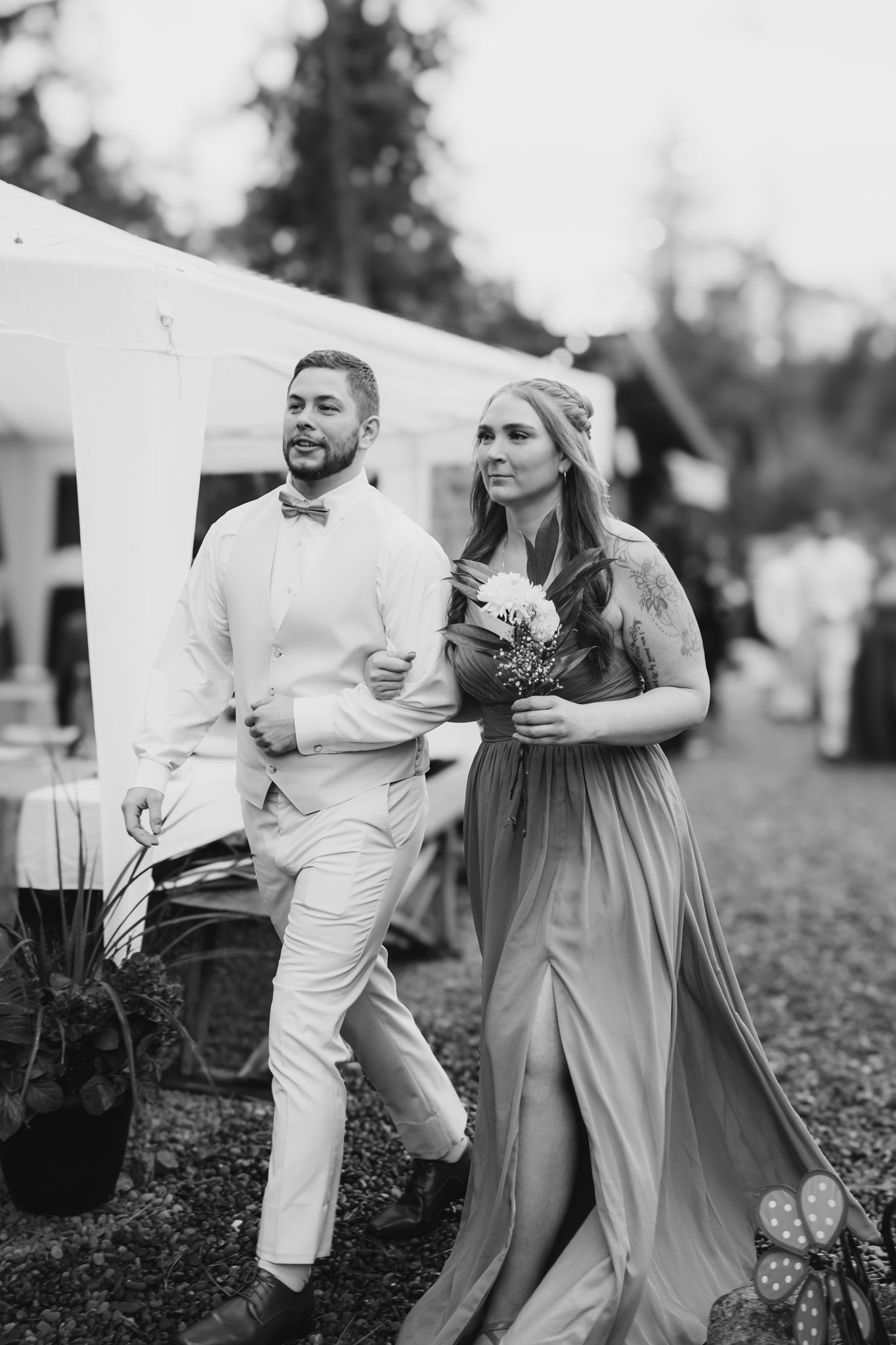 groomsman and bridesmaid come in