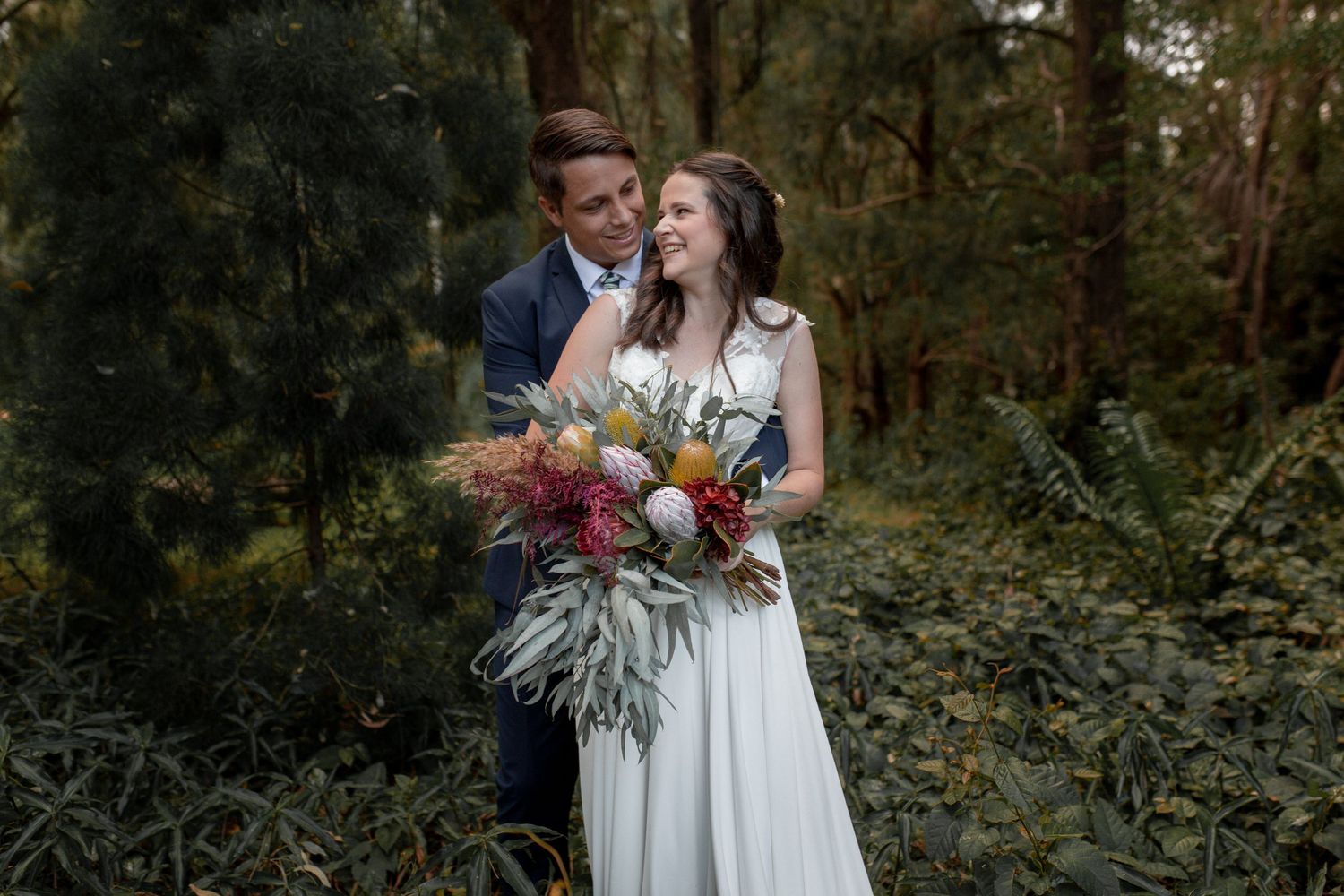 Wedding Bride and Groom Portraits in a Rainforest Wedding