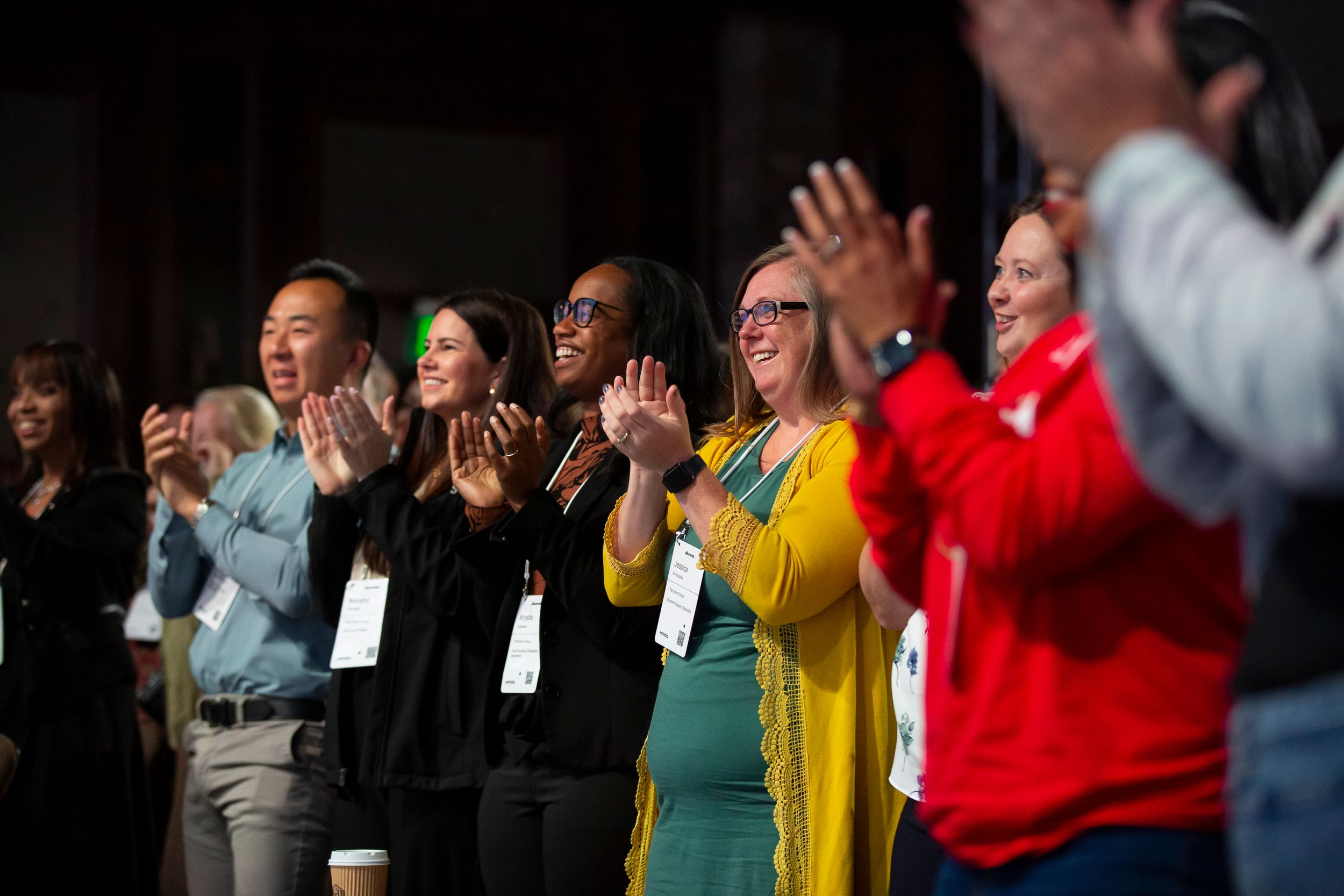 Audience clapping at event