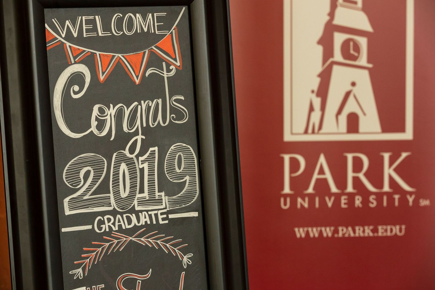 Up close photo of sign at park university graduation event in davis county utah