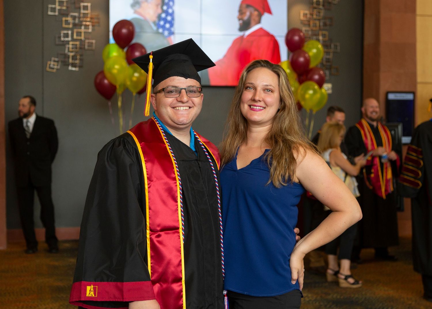 Graduate with family at park university graduation in layton utah