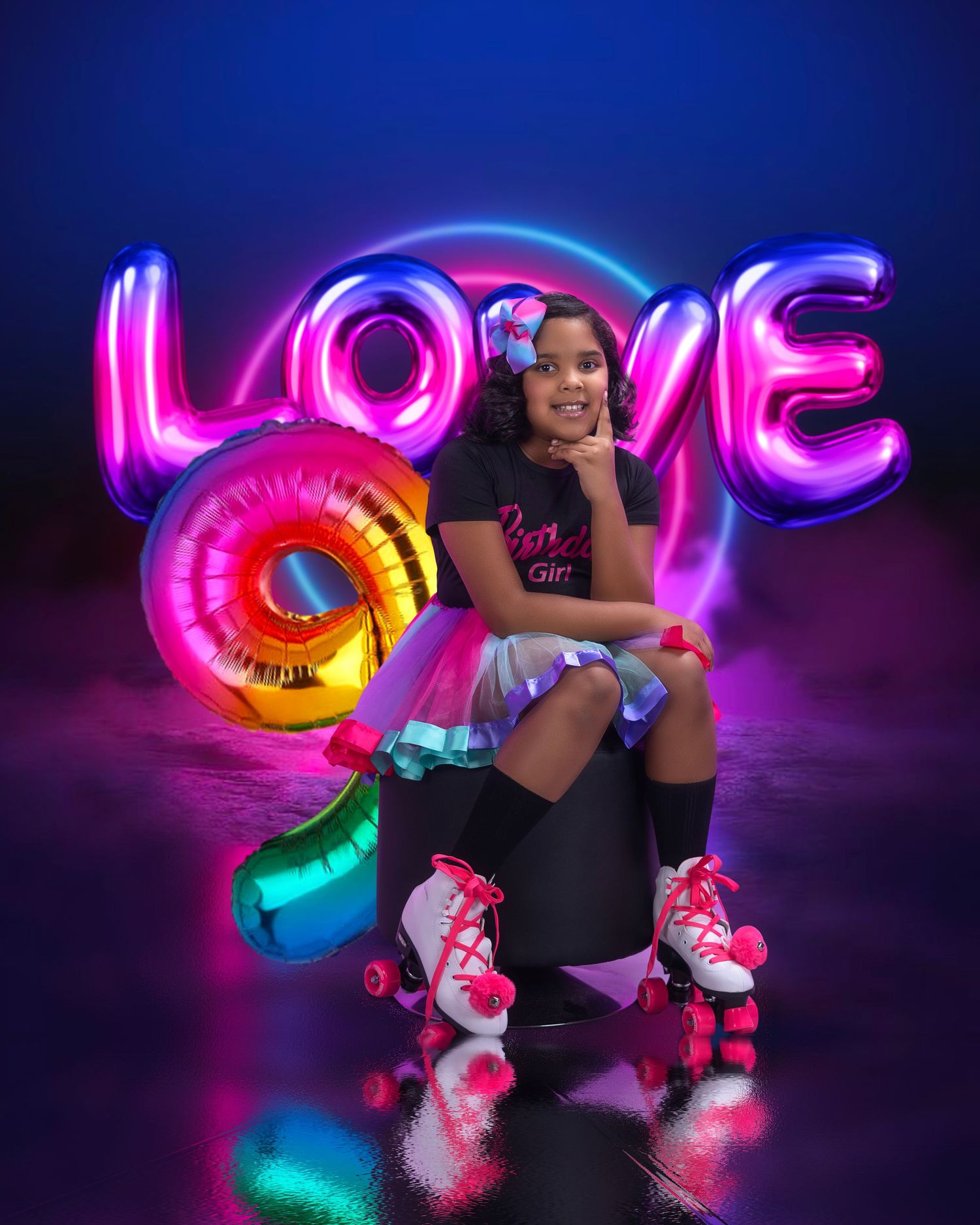 Vibrant roller skate photoshoot with neon LOVE sign and rainbow balloon decorations.