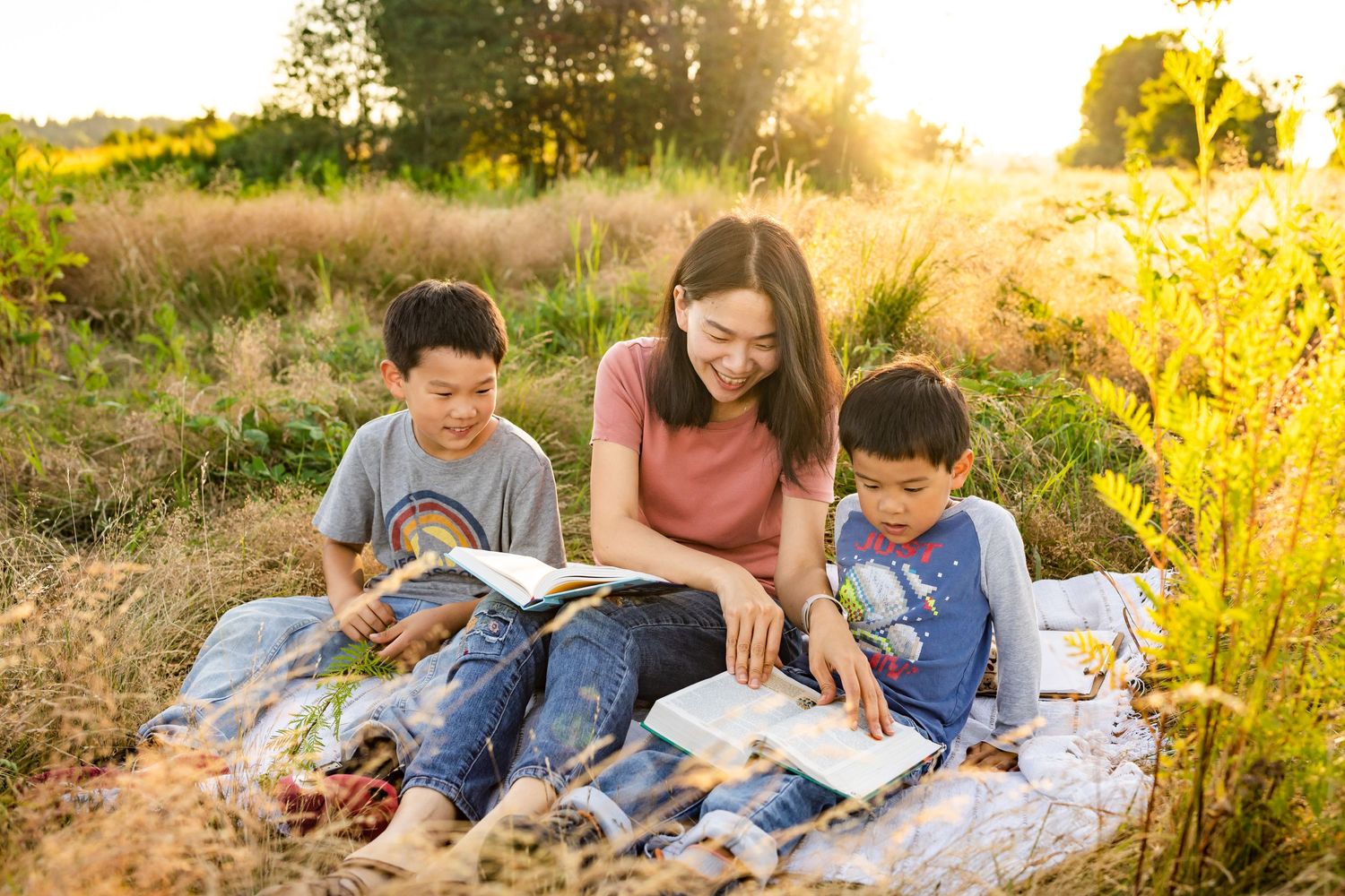 Mother doing a bible study with her boys in a Redmond park