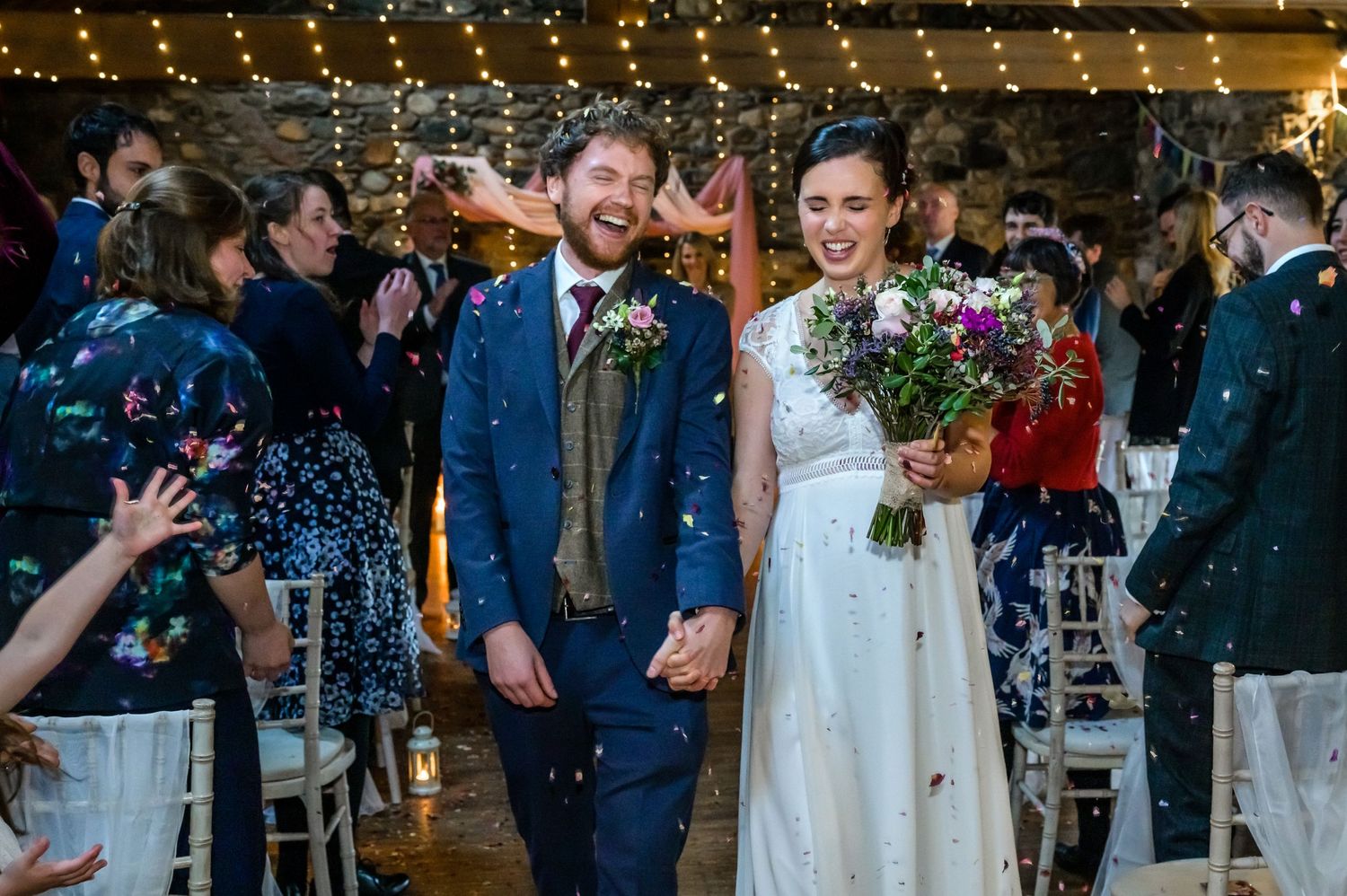 Confetti exit after Low Hall The Lakes wedding ceremony