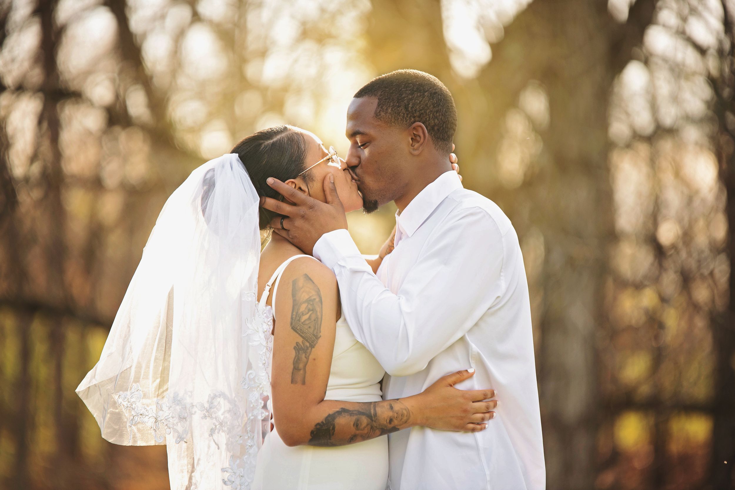 A romantic wedding photo collage showing intimate moments between a couple in white attire against a natural outdoor setting.