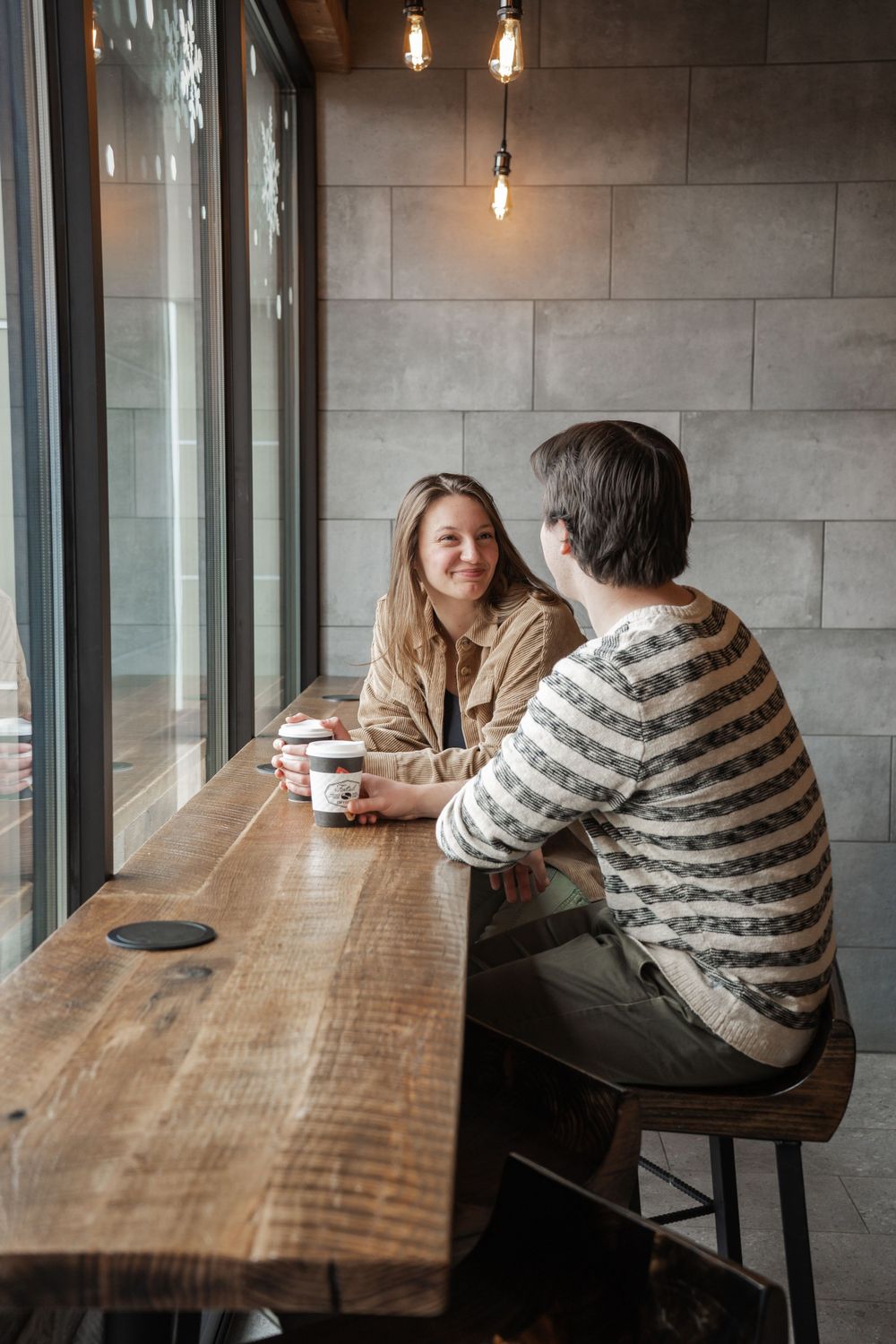 A couple at a coffee shop