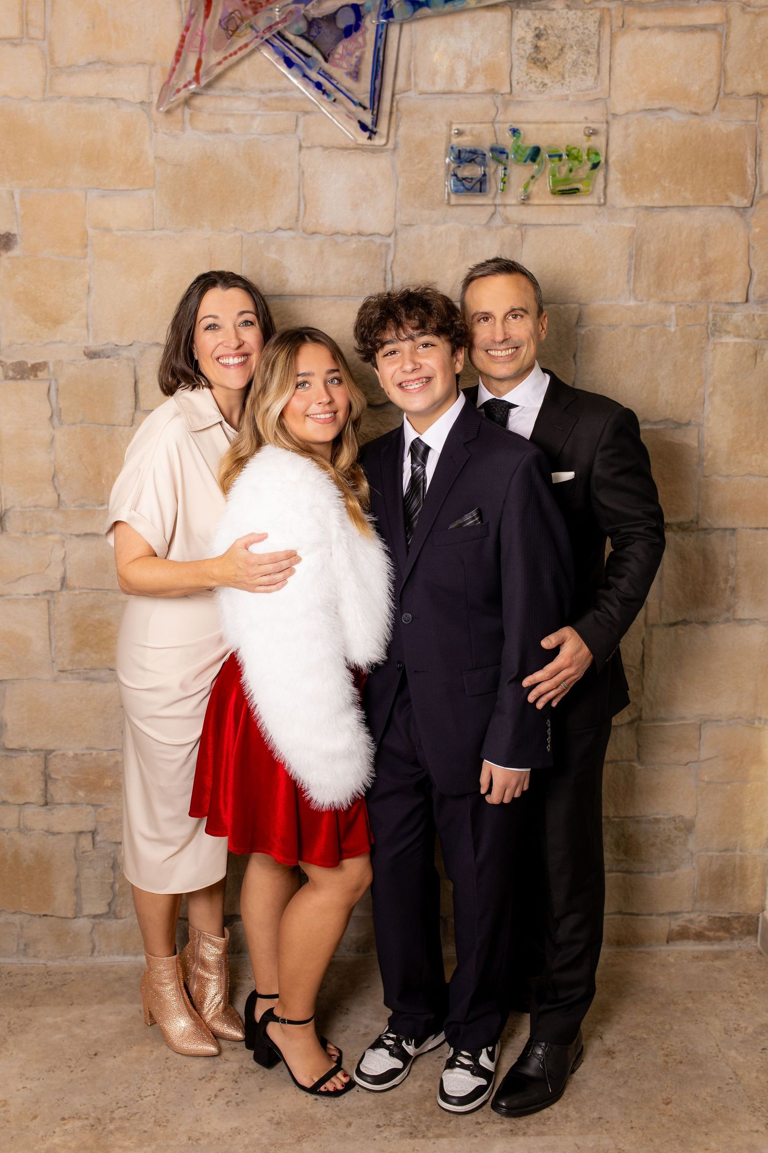 Bar Mitzvah family pose in synagogue - Bar Mitzvah Photography