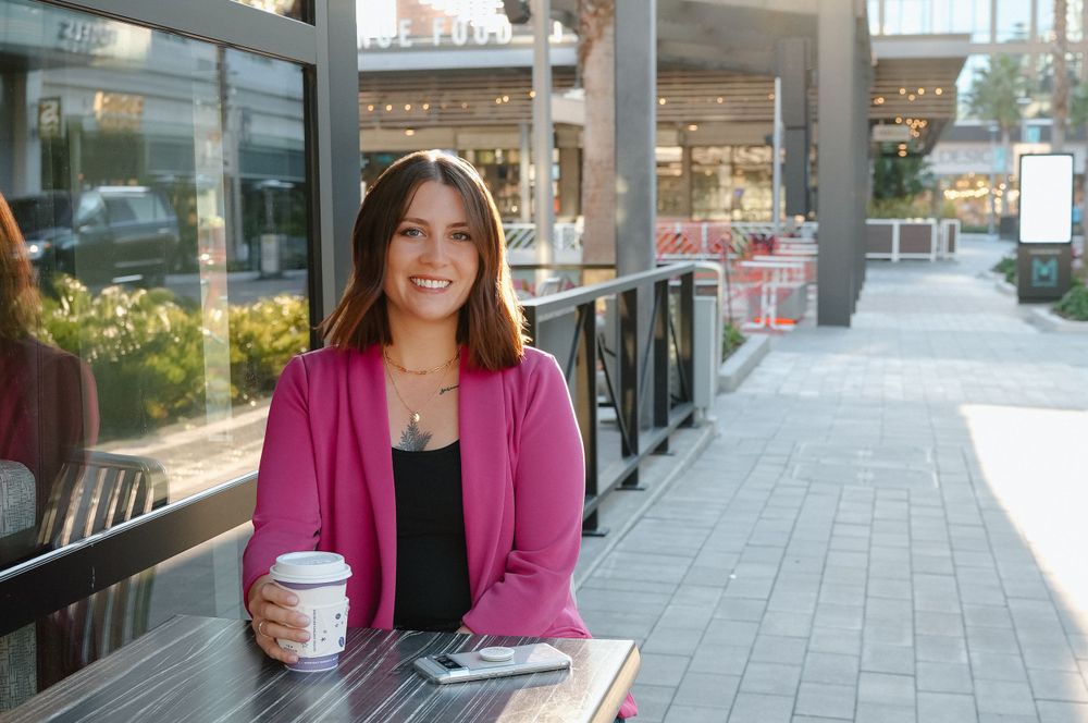 Branding headshot of woman at coffee shop in Tampa, FL.