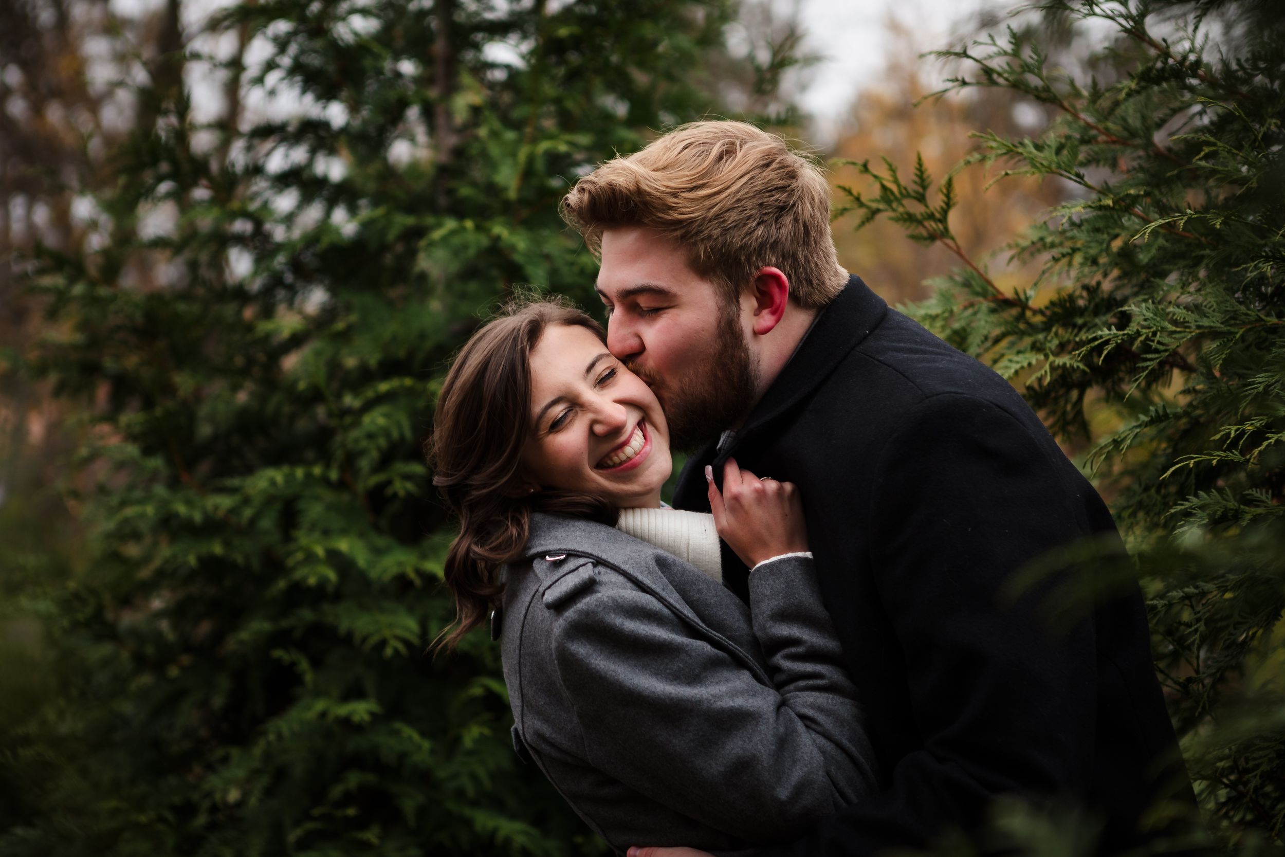 Engagement session in pine trees