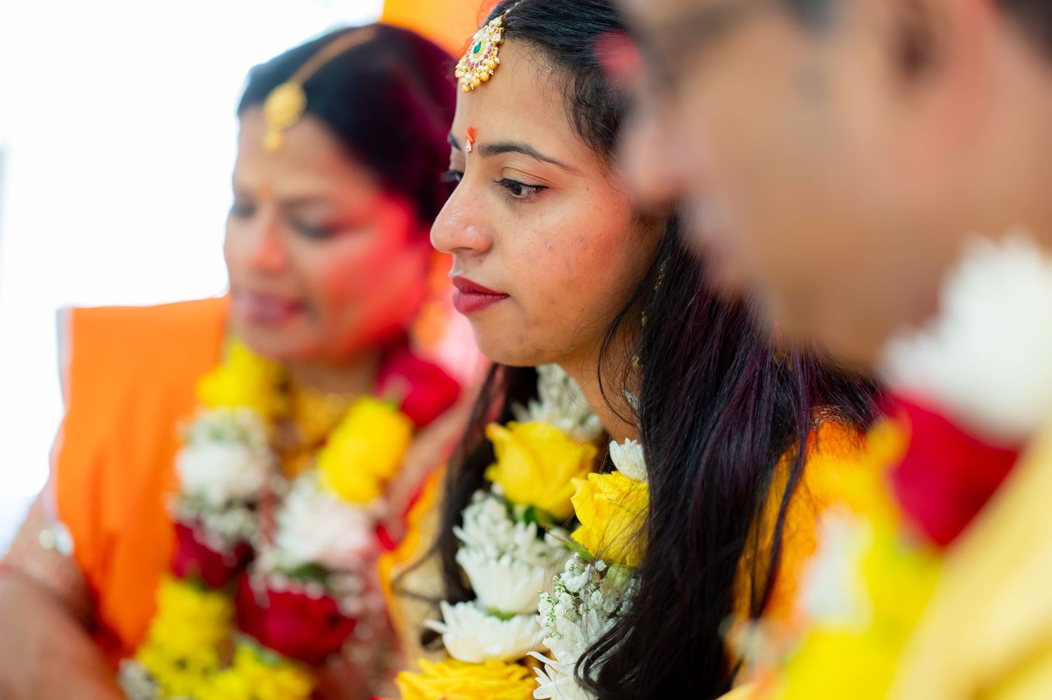 Colorful traditional celebration featuring bright orange and yellow decorative elements.