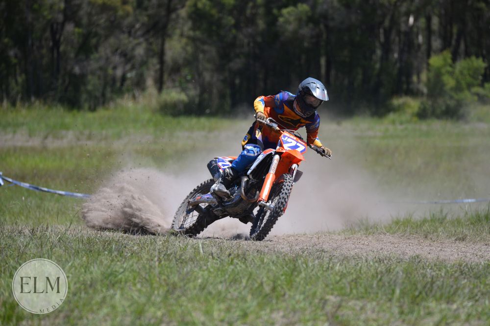 Motorbike flicking up dust