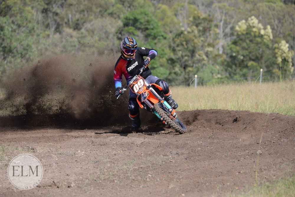 Motorbike flicking up dust