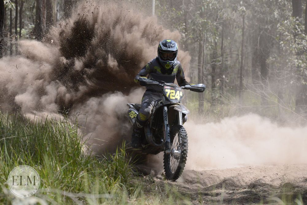 Motorbike flicking up dust