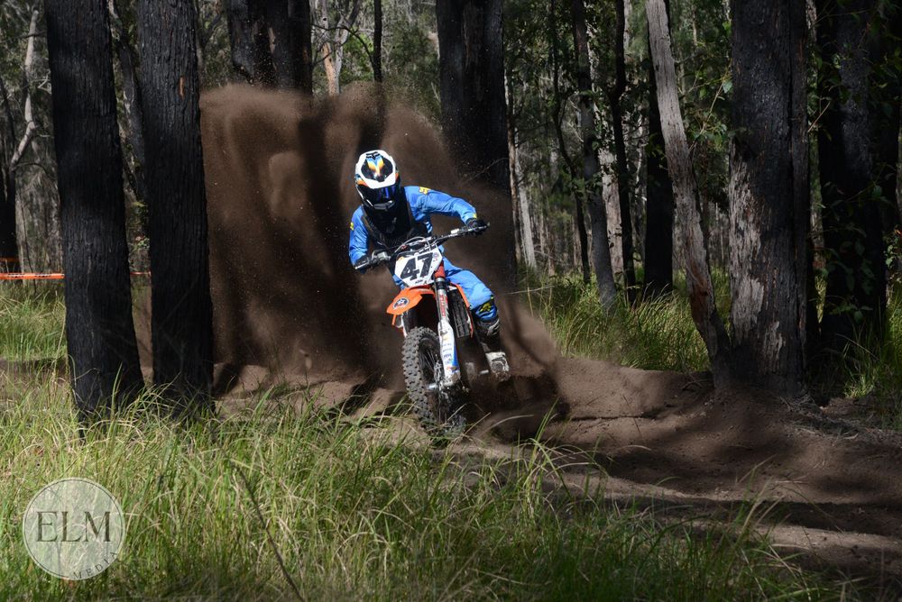 Motorbike flicking up dust