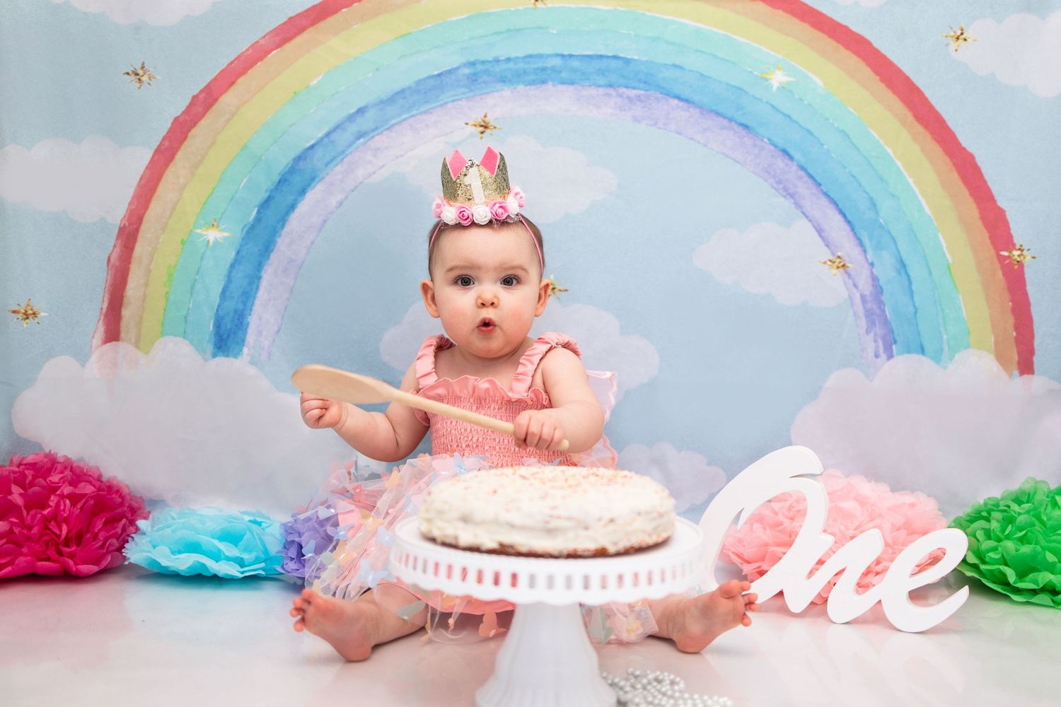 baby girl cake smash and splash rainbow theme Tameside photographer photography