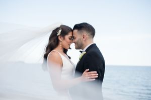 Romantic wedding portraits captured against a misty ocean backdrop. The Tyde at Walnut Beach Milford CT