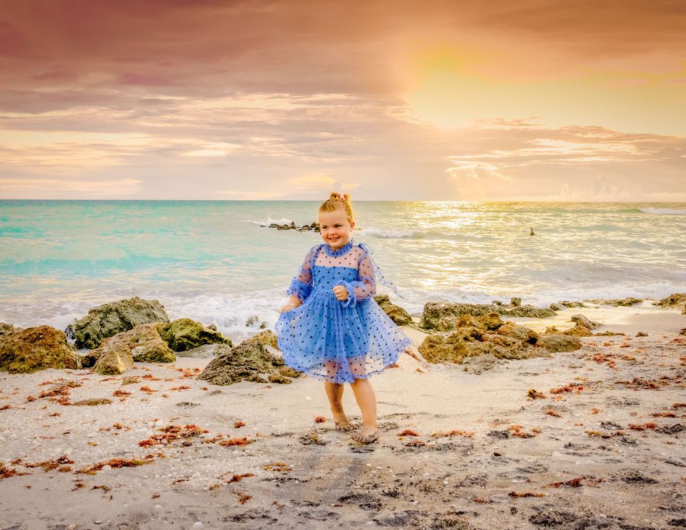 beach family photo session sarasota siesta key beach golden hour