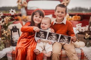 A collage of pregnancy announcement photos with pumpkins and sonogram images in an autumn outdoor setting.