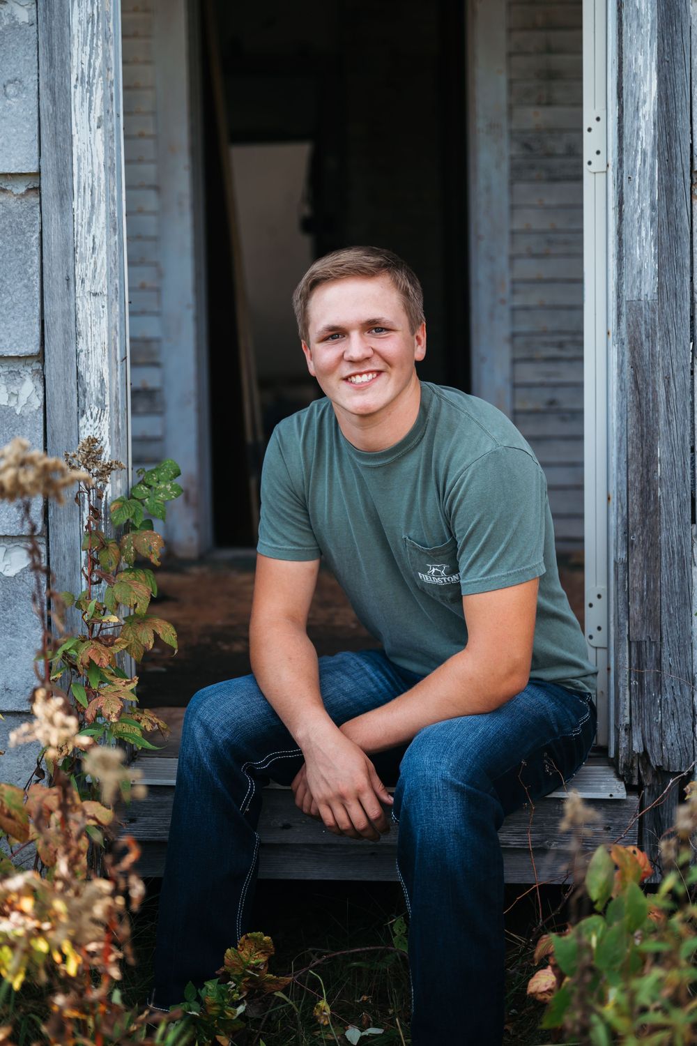 Jaxin posing for senior grad photo