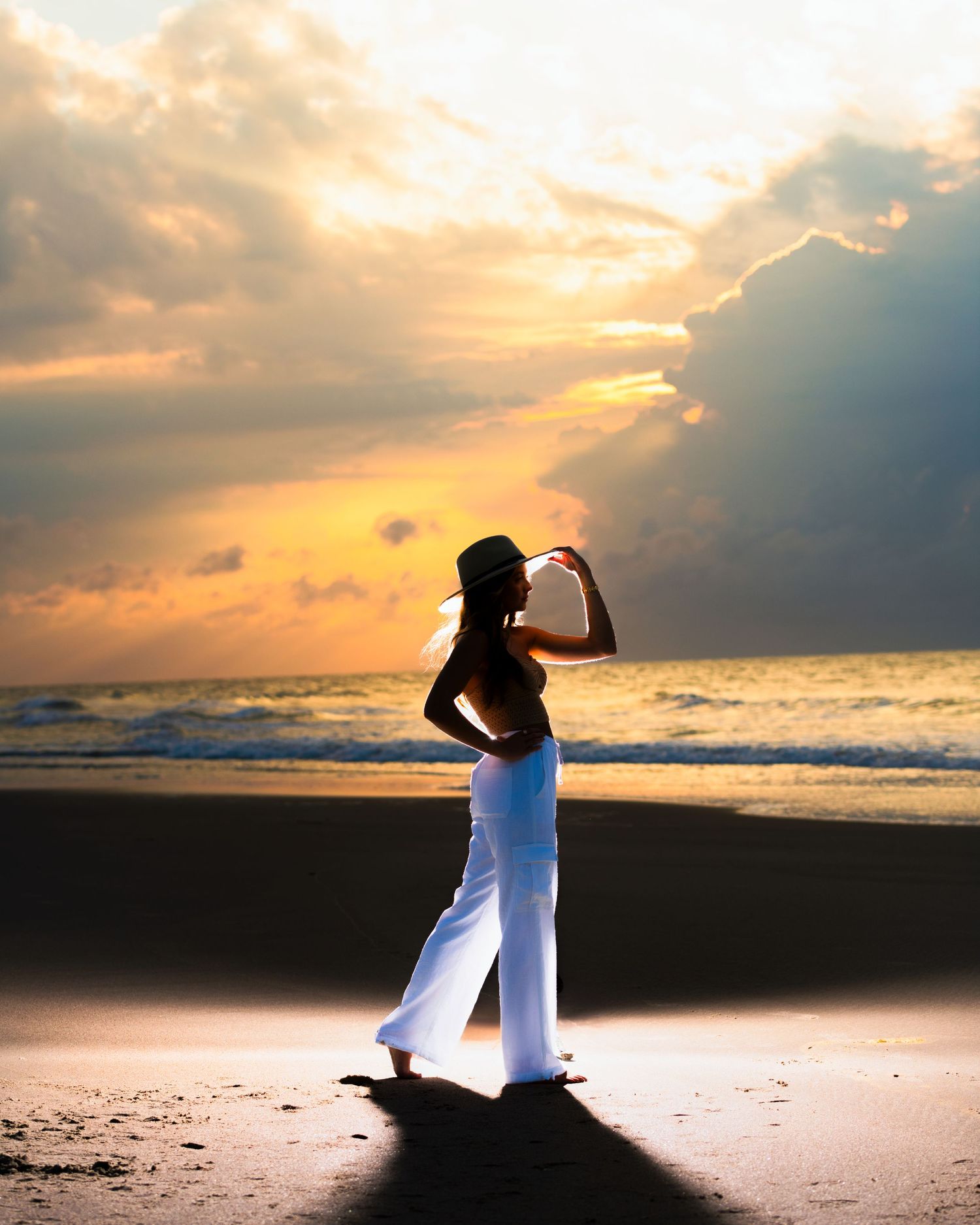Silhouette on beach with dramatic sunset and clouds. Myrtle beach photographer