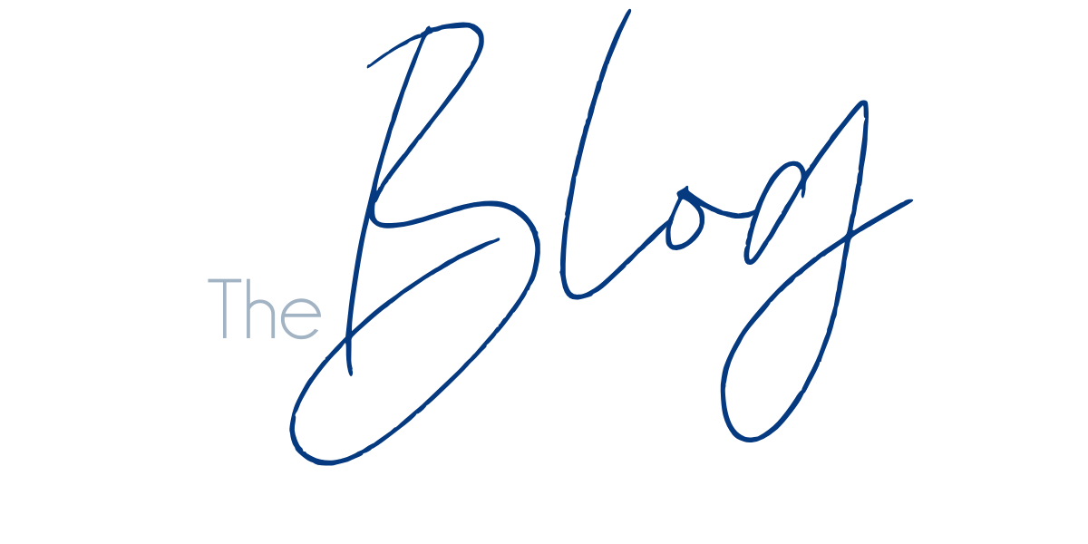 Stylized blue text reading 'The Blog' in cursive lettering against a white background.