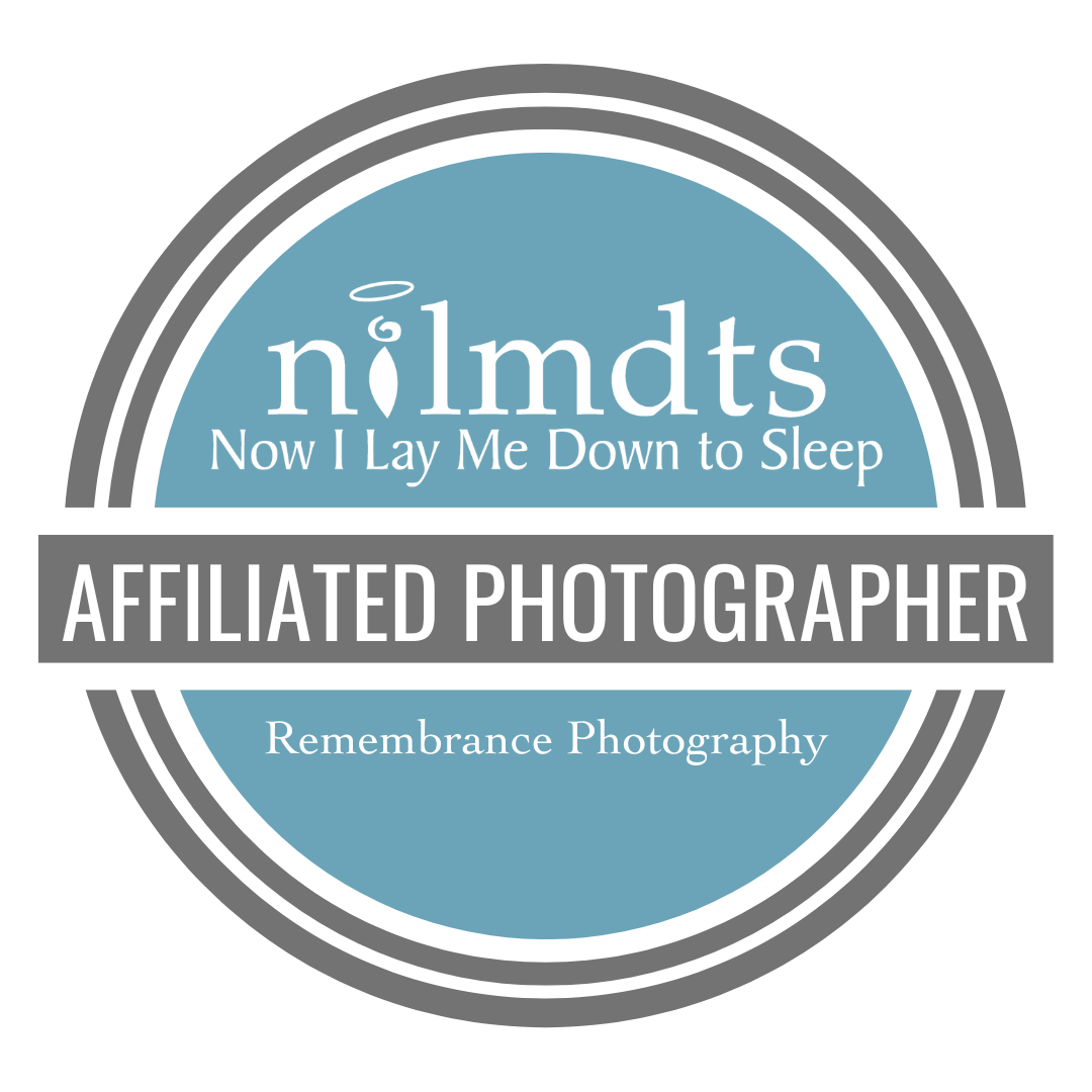 Circular blue and gray badge for NILMDTS Affiliated Photographer certification.