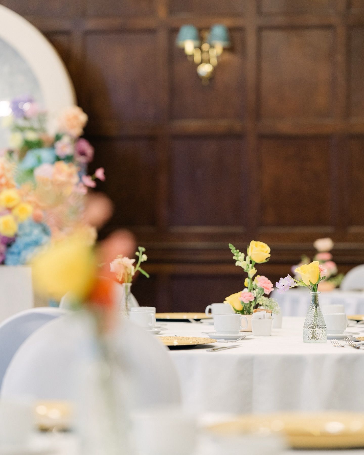 artistic  wedding table detail with soft focus florals and elegant reception styling in Regina wedding styling