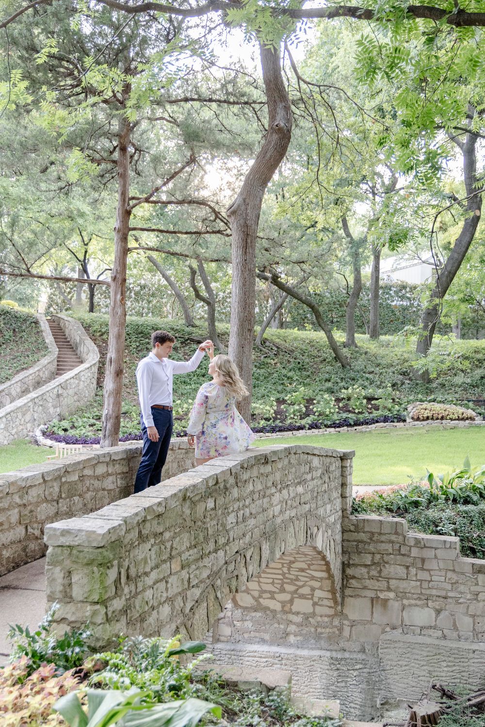 Austin engagement photographer capturing playful couple moments in a natural outdoor setting