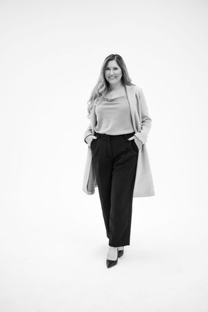 A black and white fashion photo series showing a model wearing business casual attire against a white backdrop.