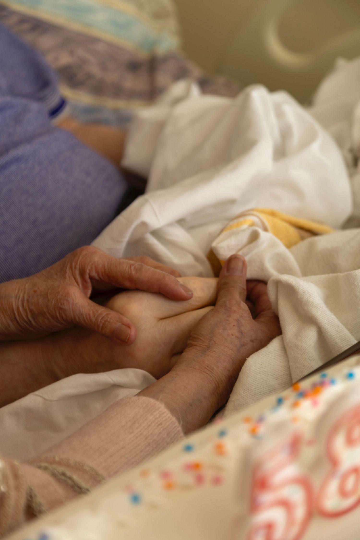 Hands holding each other