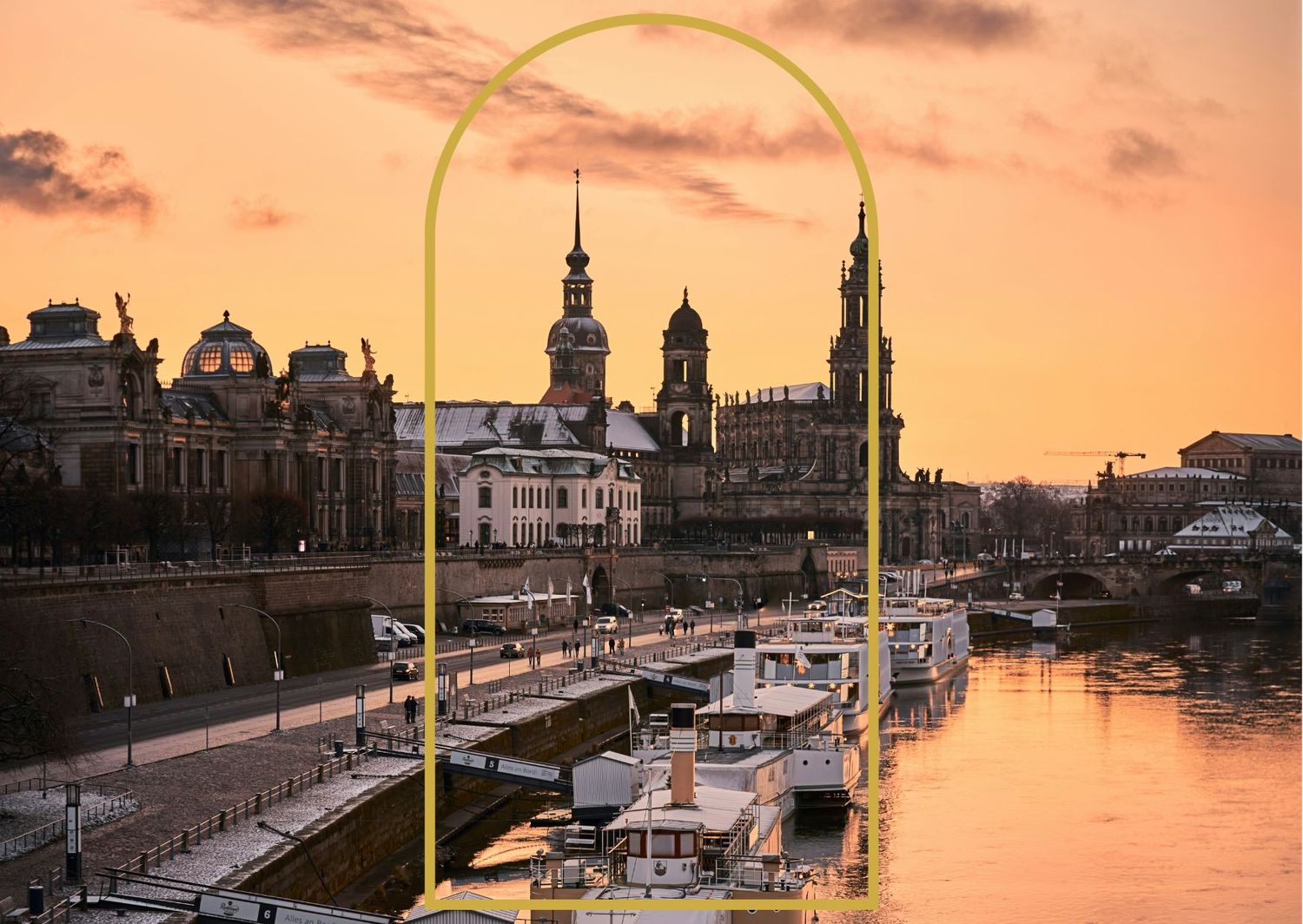 Historic Dresden skyline at sunset with golden arch frame and boats along the river.