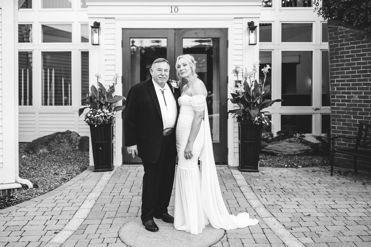 Romantic wedding moment in front of the Federal Hotel in Brunswick, Maine.