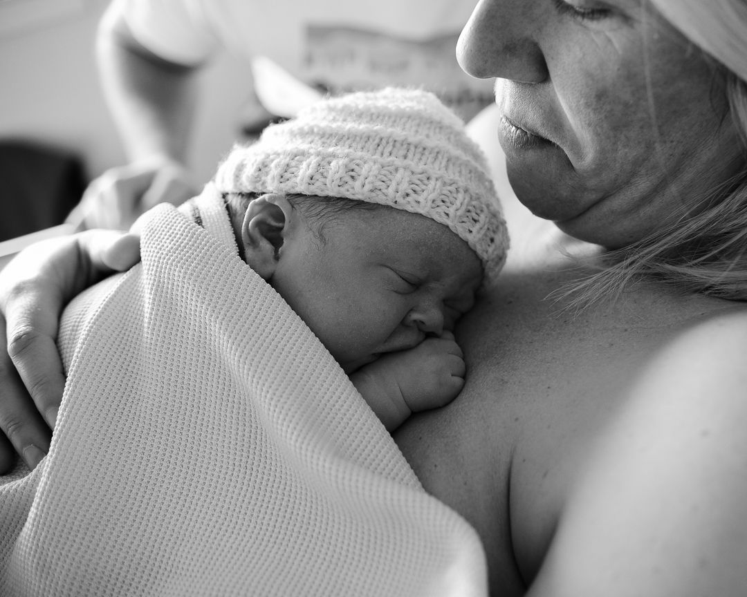 parents with newborn baby few hours after c-section birth in edinburgh lothian hospital