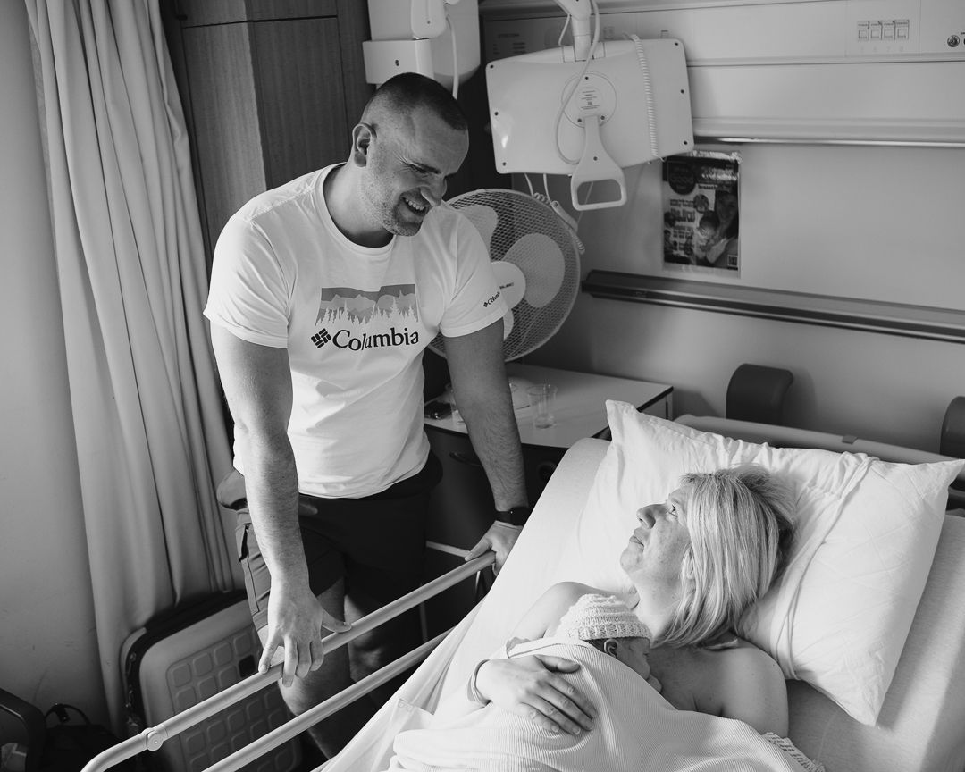 parents with newborn baby few hours after c-section birth in edinburgh lothian hospital