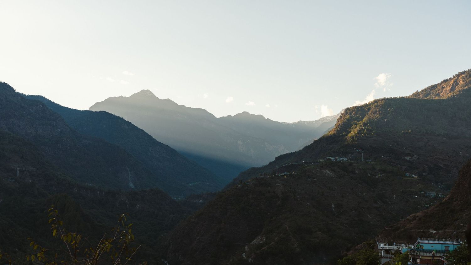 Hikers climbing rocky mountain terrain during an outdoor adventure expedition.