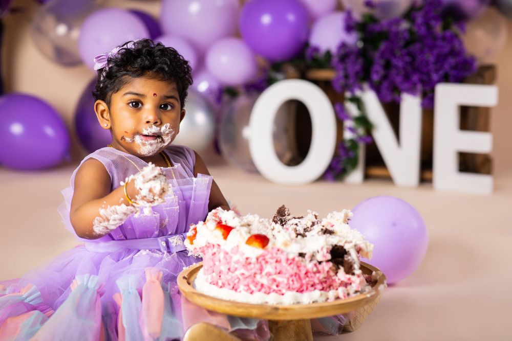 Little baby eating the cake