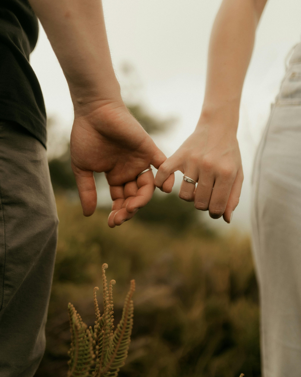 engagement ring on finger. Happy, in love. Engegement shoot