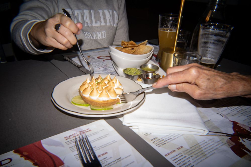 Key lime pie is eaten by two people at a restaurant in Manhattan Beach in California in July 2026.